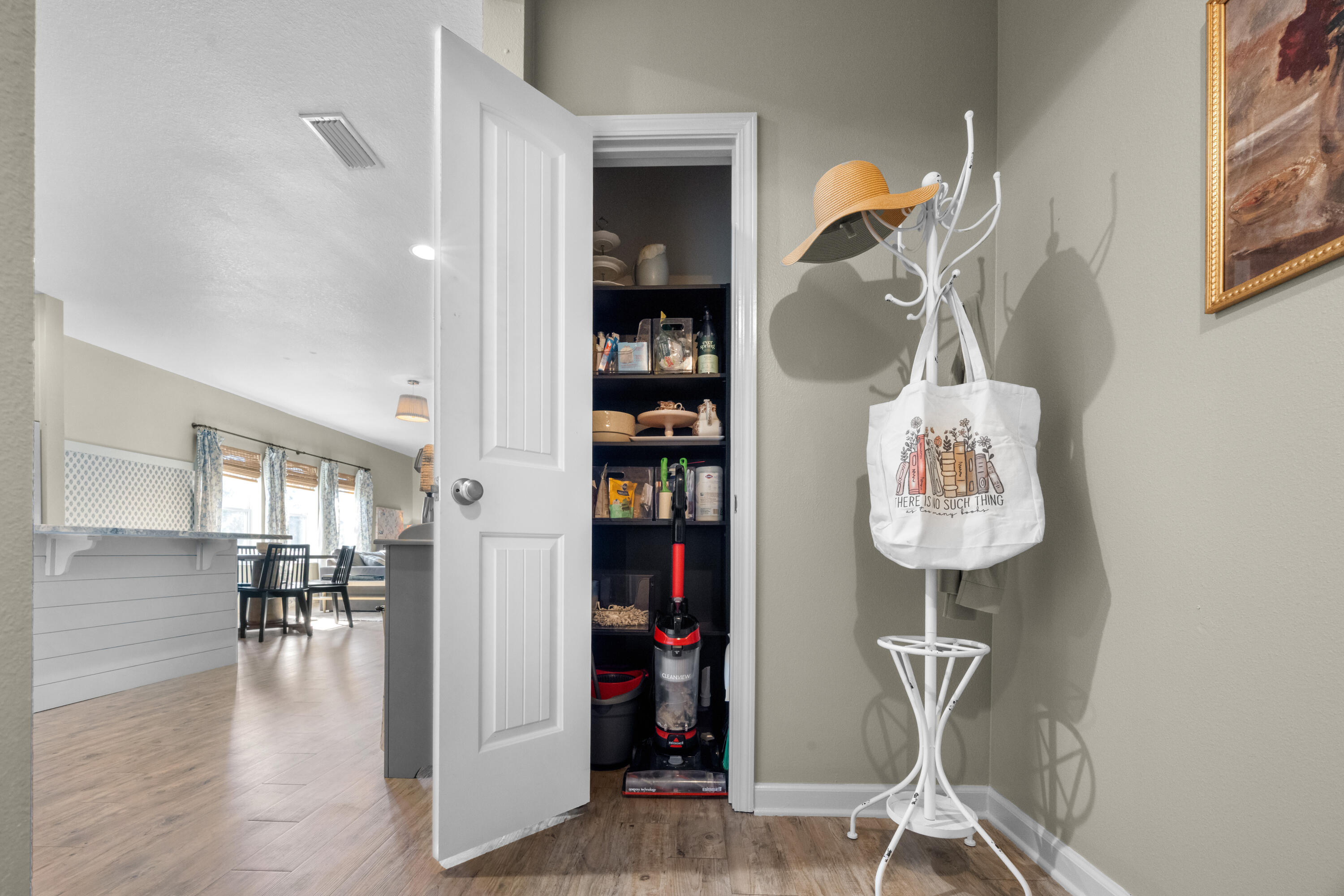 110 Cornelia Street Freeport, FL 32439 - Photo 10 of 60 a room with lots of books and a glass door