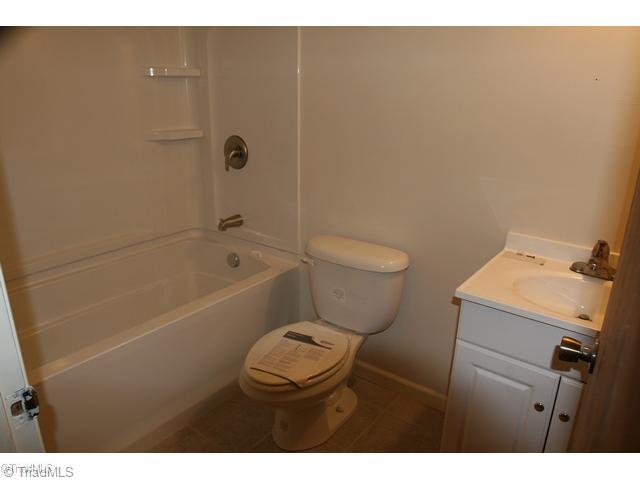 635 Highway 65 Rural Hall, NC 27045 - Photo 8 of 11 Other. All new bath with tile floor