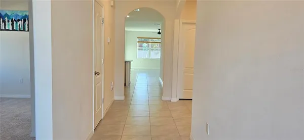 a view of a bathroom from a hallway
