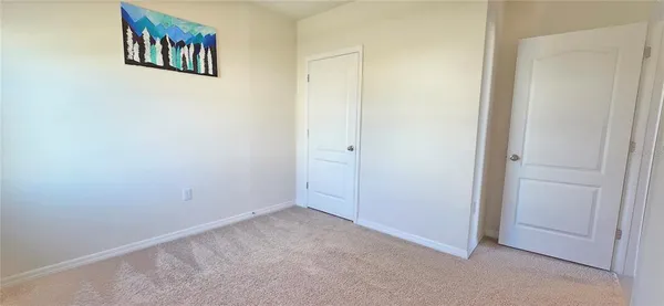 an empty room with a elevator