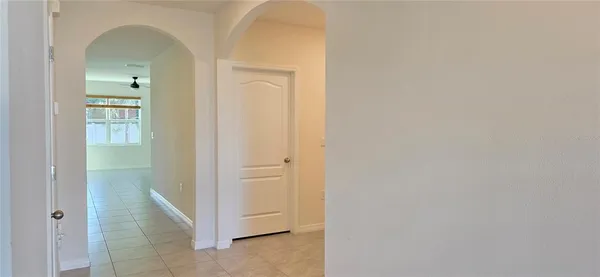 a view of a bathroom with mirror