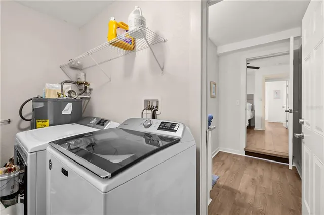 a kitchen that has a sink and a stove