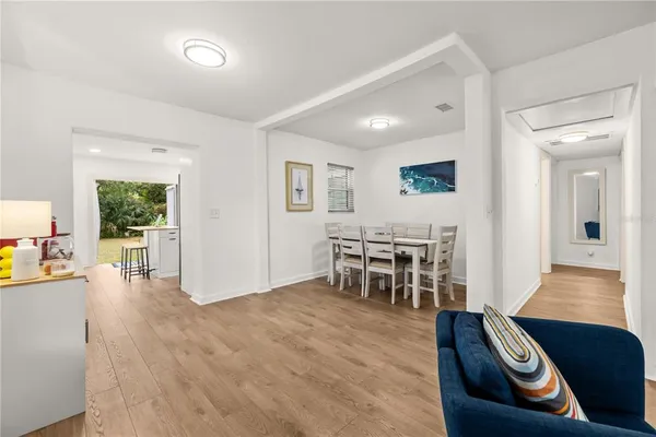 a view of a living room and dining room