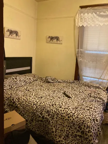 a kitchen with granite countertop a sink and cabinets