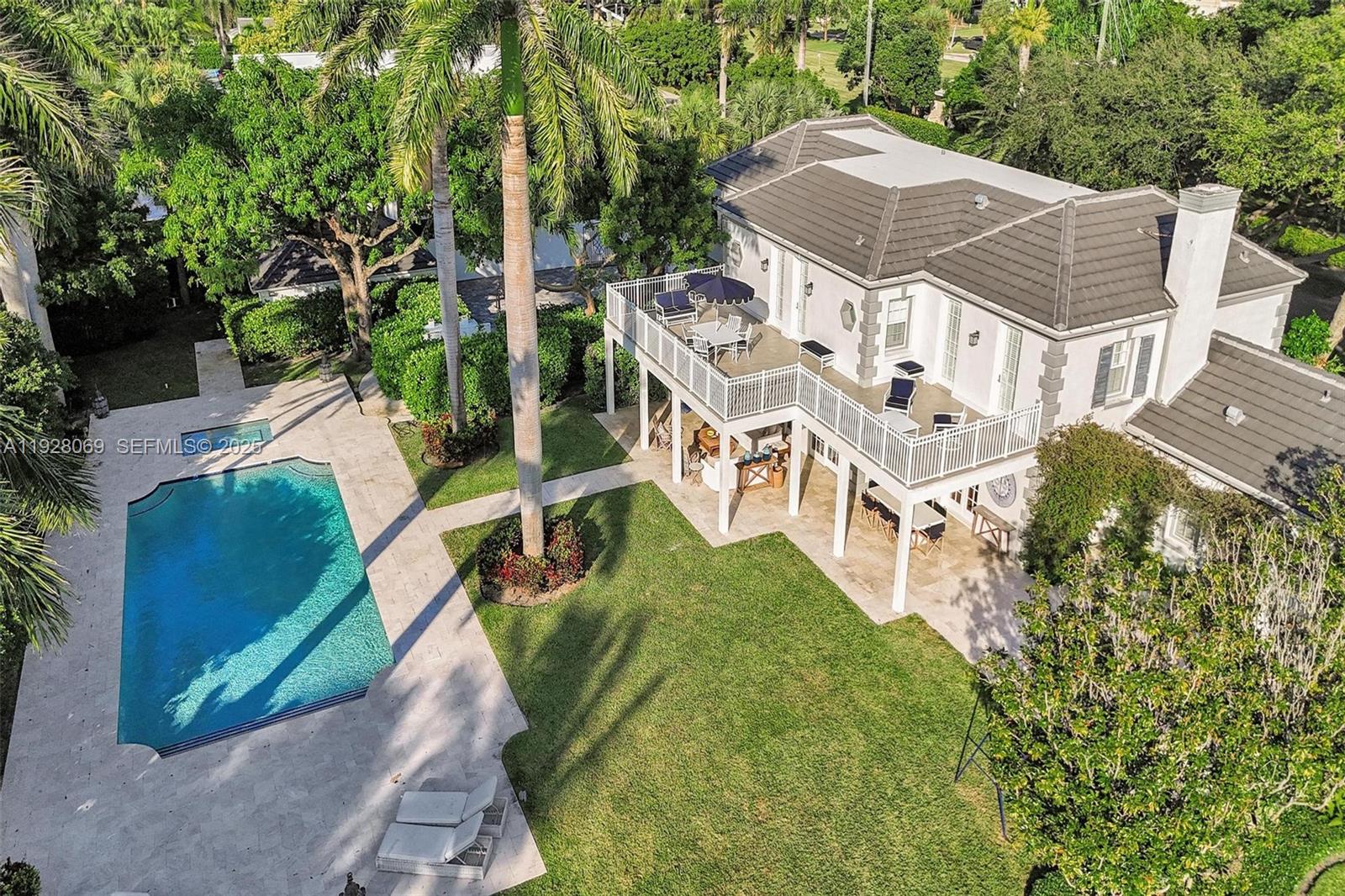 1281 Banyan Road Boca Raton, FL 33432 - Photo 67 of 69 an aerial view of a house with a yard