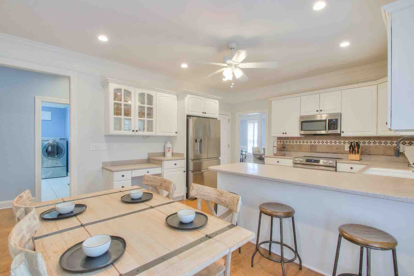 206 Polk Pl Drive Franklin, TN 37064 - Photo 16 of 47 a kitchen with stainless steel appliances granite countertop a sink and cabinets