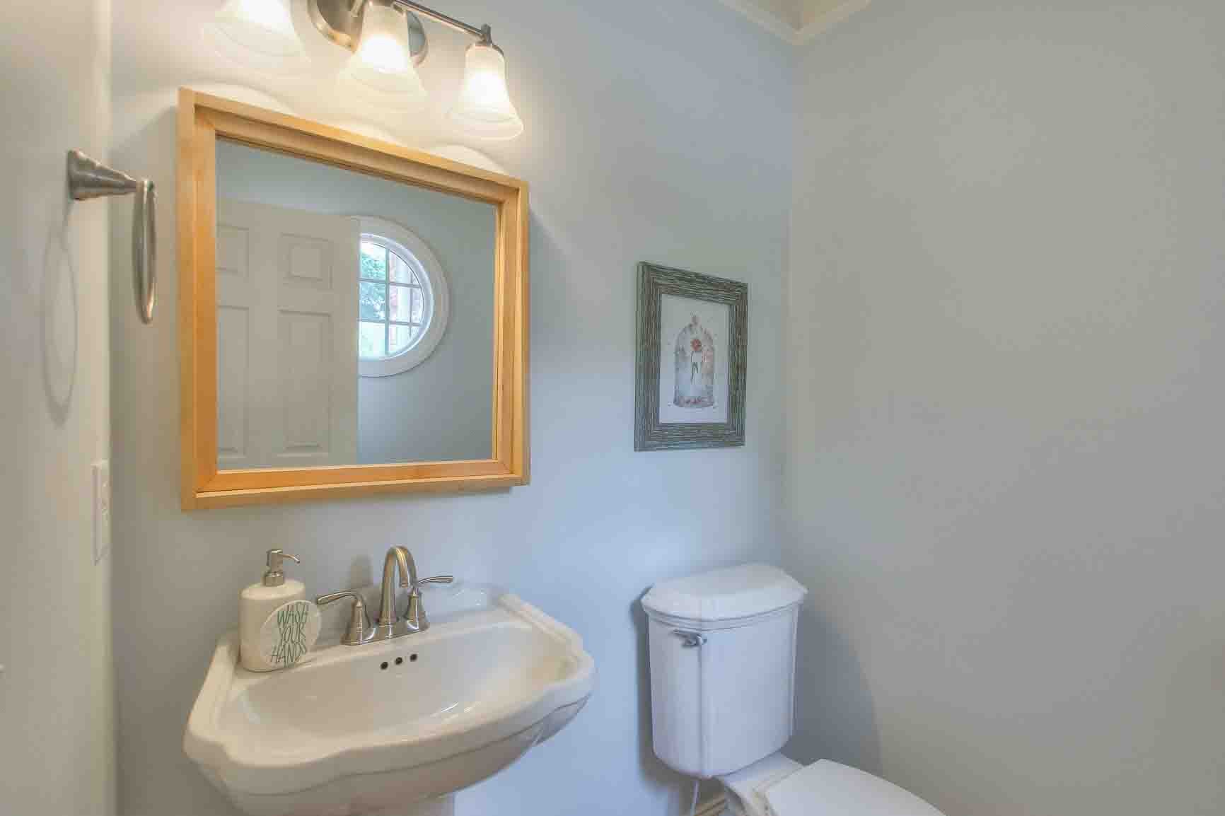 206 Polk Pl Drive Franklin, TN 37064 - Photo 17 of 47 a bathroom with a toilet sink and mirror