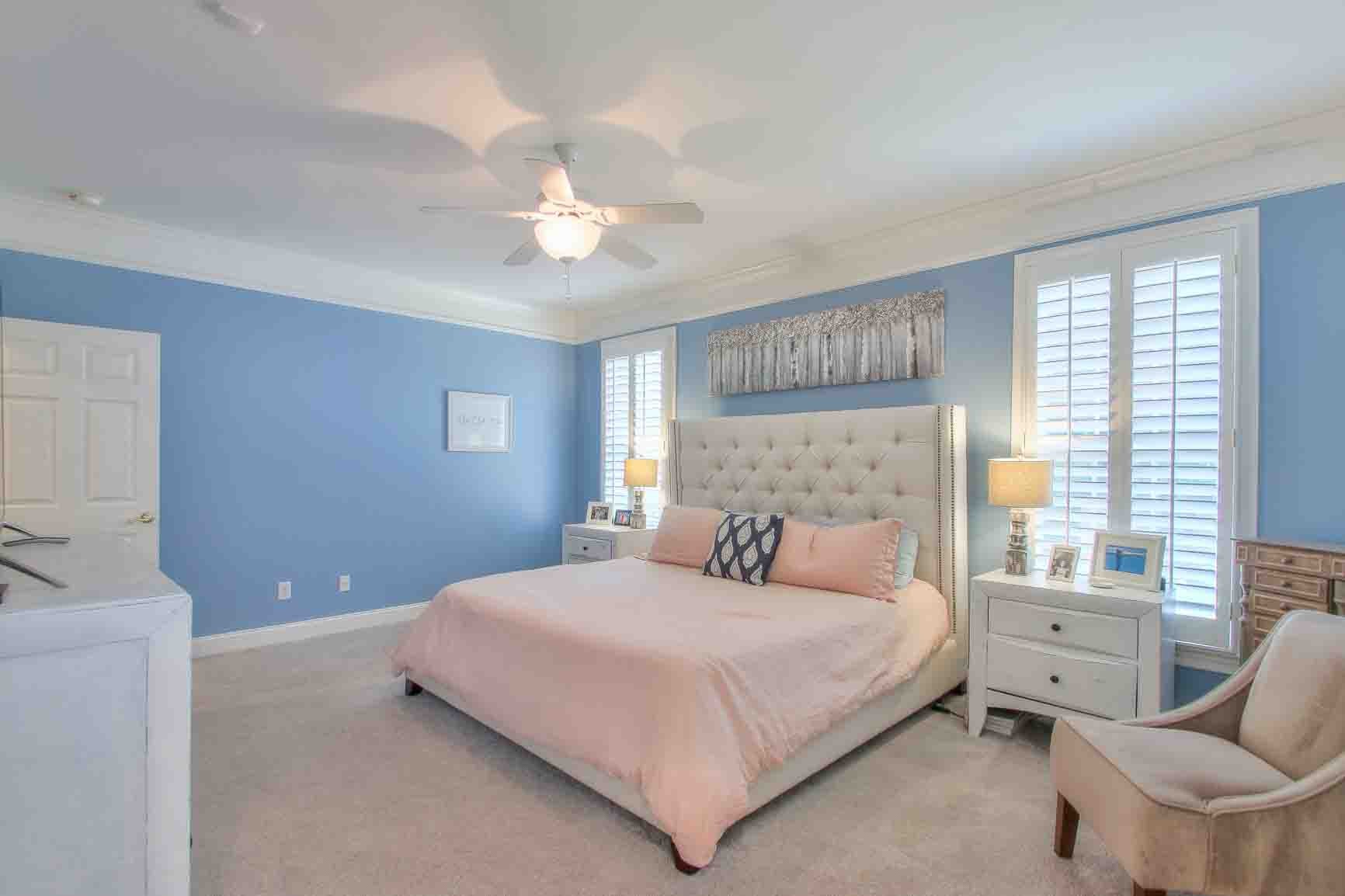 206 Polk Pl Drive Franklin, TN 37064 - Photo 20 of 47 a bedroom with a bed and a chandelier