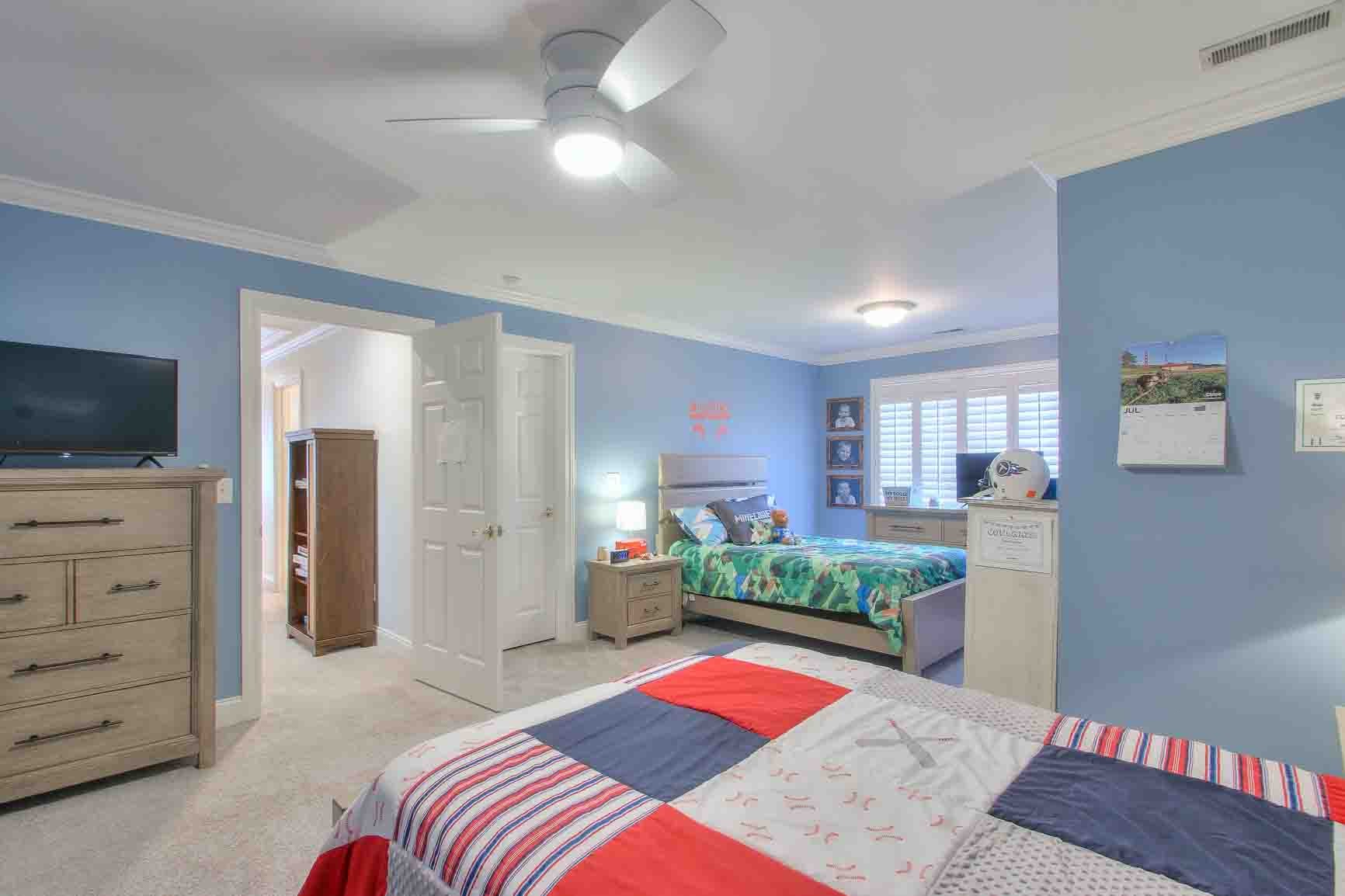 206 Polk Pl Drive Franklin, TN 37064 - Photo 31 of 47 a bedroom with a bed and flat screen tv