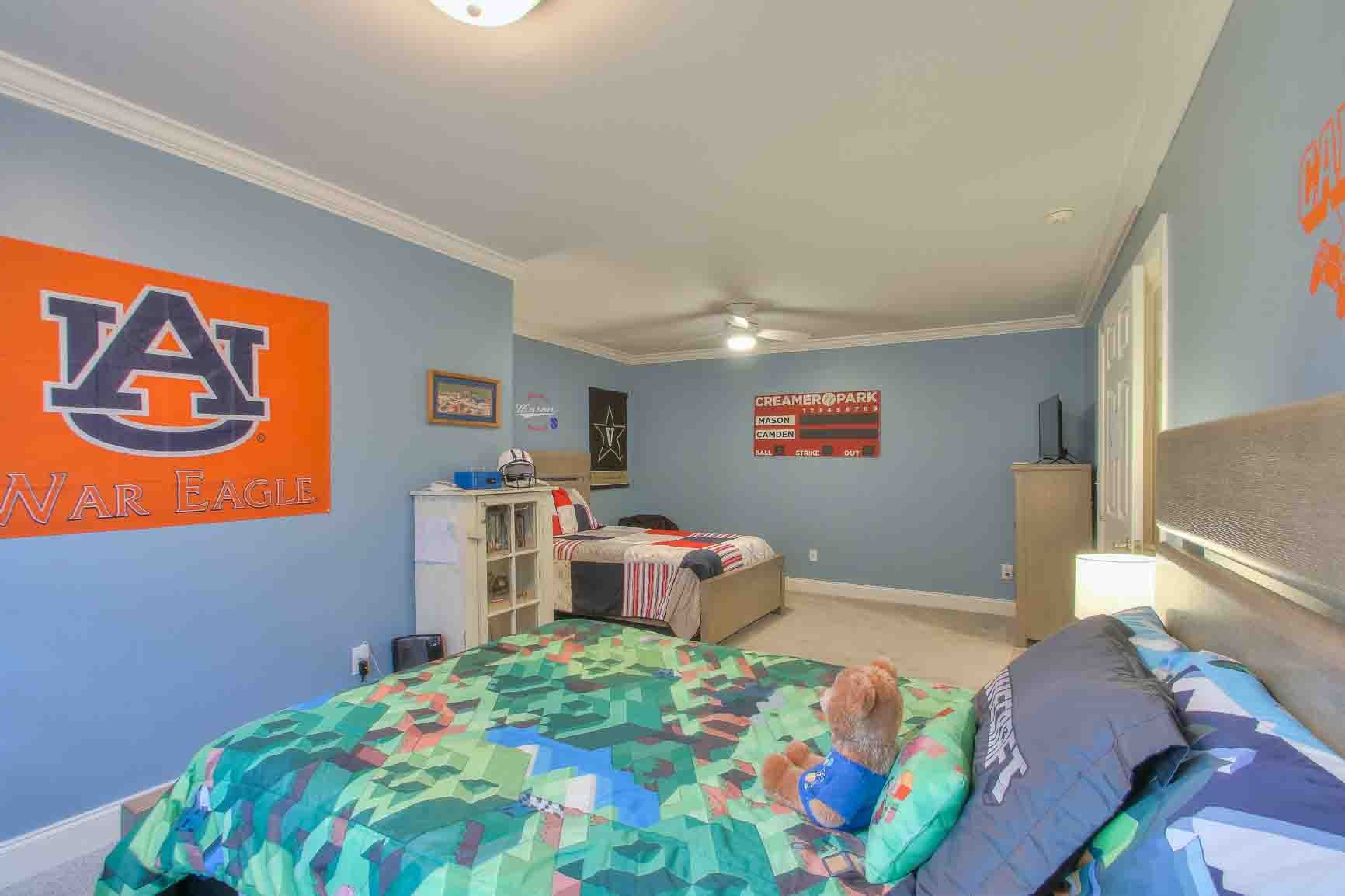 206 Polk Pl Drive Franklin, TN 37064 - Photo 32 of 47 a bedroom with bed and window