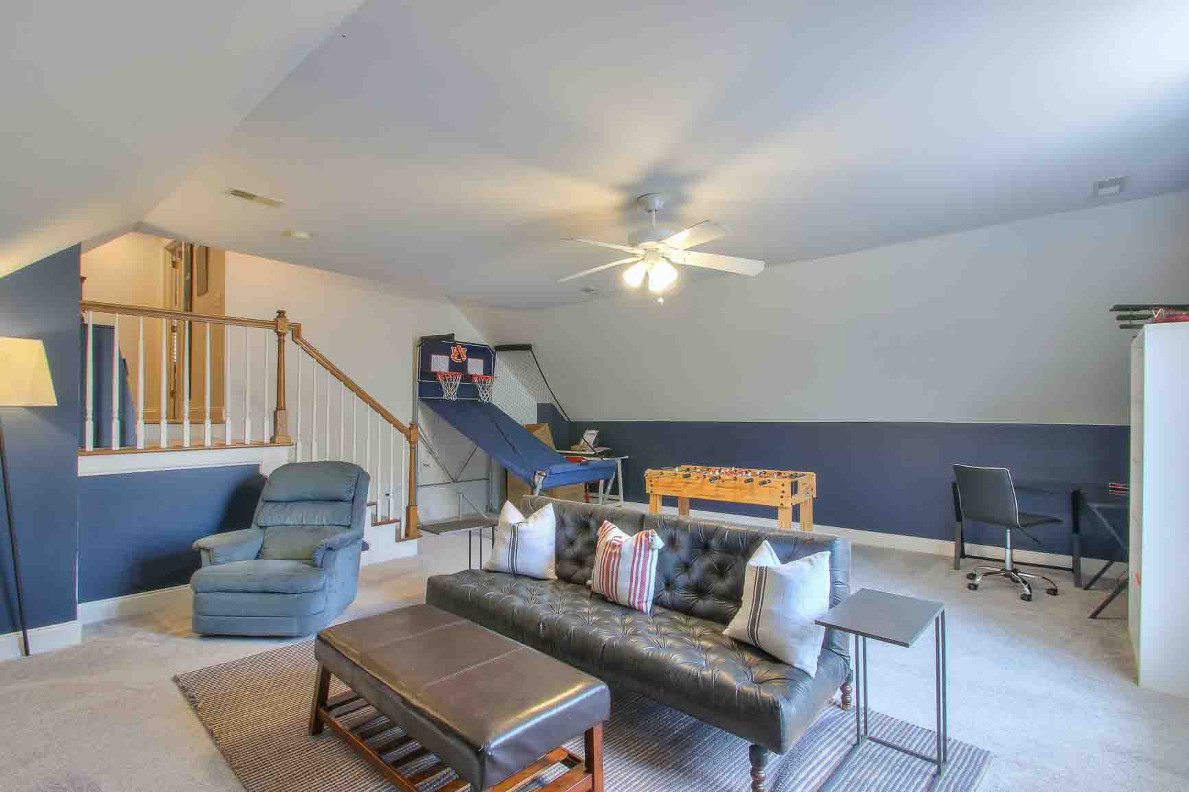 206 Polk Pl Drive Franklin, TN 37064 - Photo 36 of 47 a living room with furniture and stairs