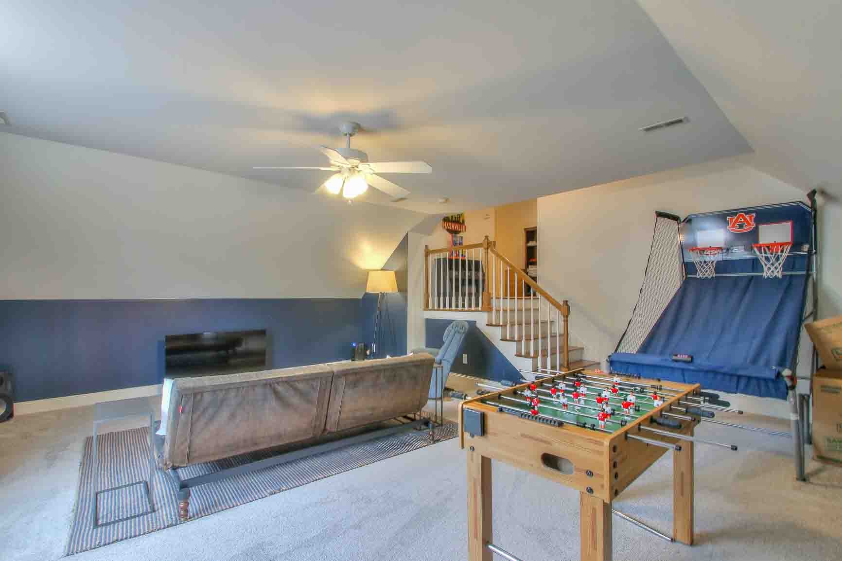 206 Polk Pl Drive Franklin, TN 37064 - Photo 38 of 47 a living room with furniture and a table