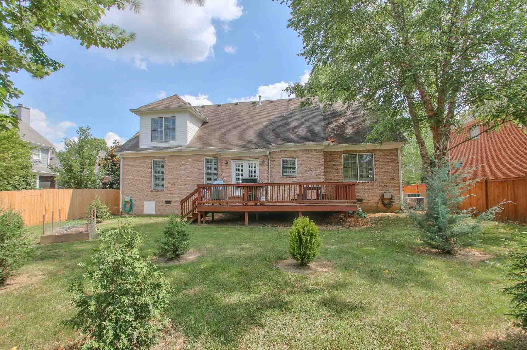 206 Polk Pl Drive Franklin, TN 37064 - Photo 39 of 47 a view of a house with a back yard