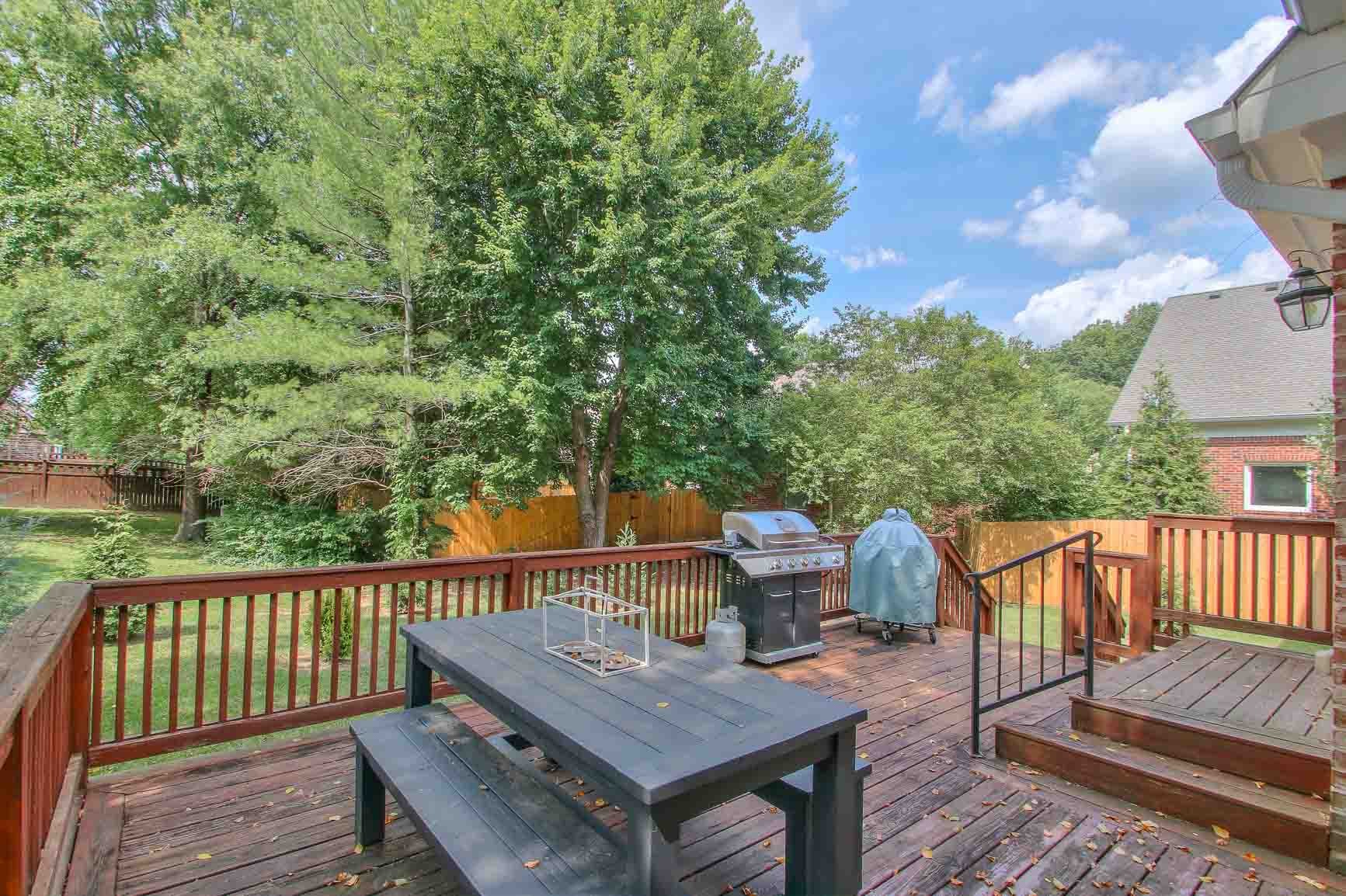 206 Polk Pl Drive Franklin, TN 37064 - Photo 42 of 47 a view of a deck with wooden floor and fence