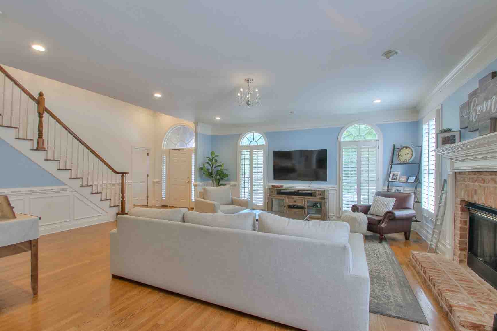 206 Polk Pl Drive Franklin, TN 37064 - Photo 8 of 47 a living room with fireplace furniture and a flat screen tv