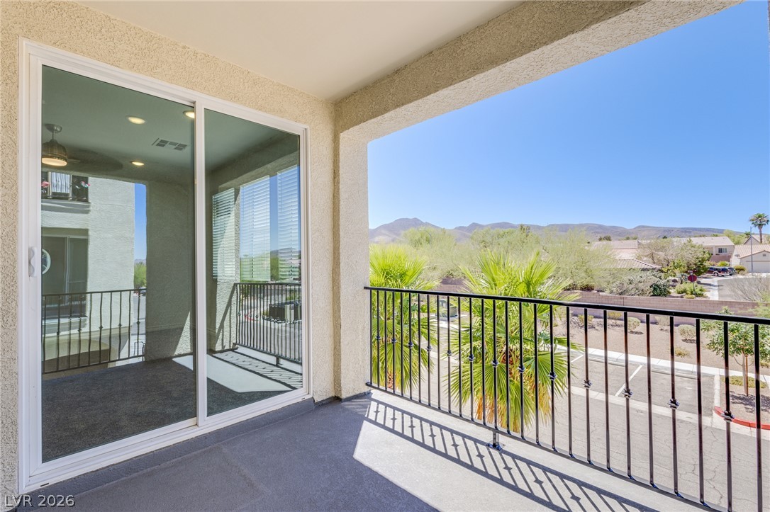 2555 Hampton Road, Unit 8206 Henderson, NV 89052 - Photo 3 of 25 Enjoy outdoor living and mountain views from this well-lit private balcony.
