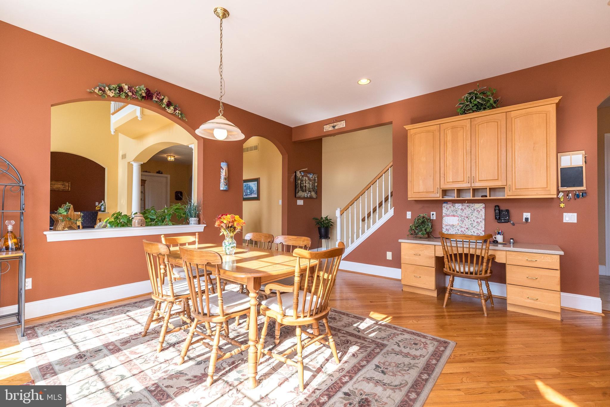 246 Rue St Andre Chalfont, PA 18914 - Photo 23 of 81 a view of a dining room with furniture window and wooden floor