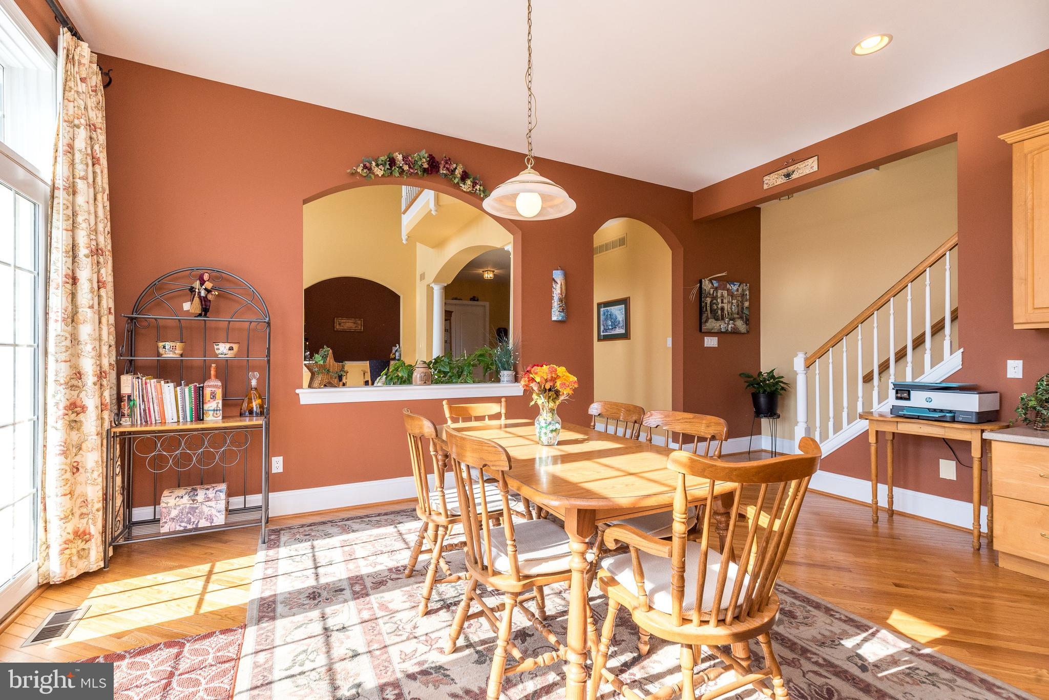 246 Rue St Andre Chalfont, PA 18914 - Photo 26 of 81 a view of a dining room with furniture and chandelier