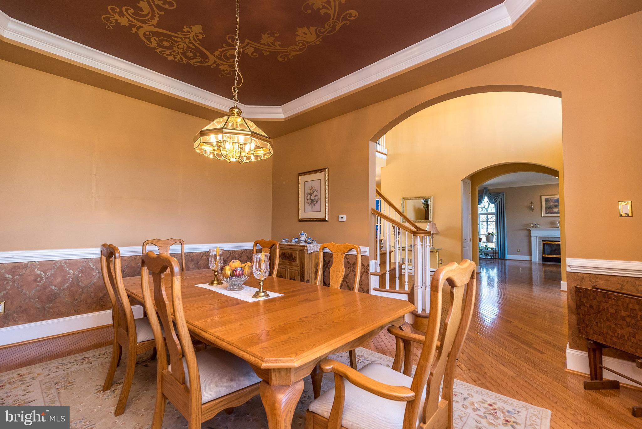 246 Rue St Andre Chalfont, PA 18914 - Photo 29 of 81 a view of a dining room with furniture and wooden floor