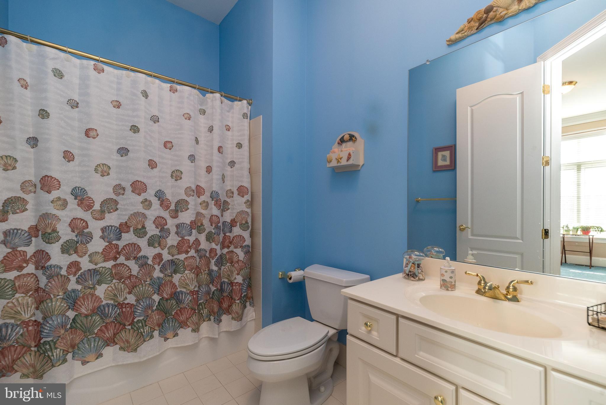 246 Rue St Andre Chalfont, PA 18914 - Photo 35 of 81 a bathroom with a sink toilet and a mirror