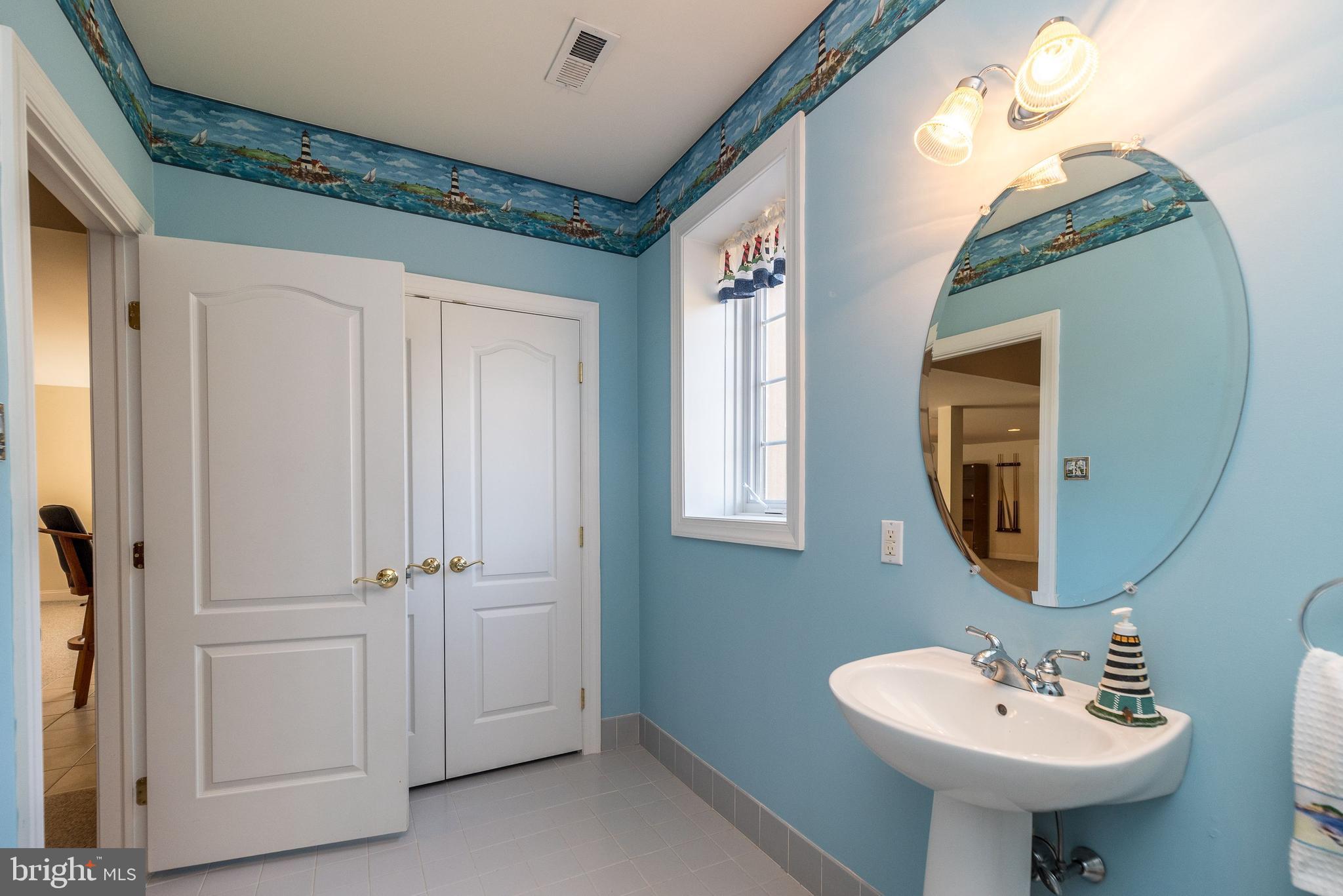 246 Rue St Andre Chalfont, PA 18914 - Photo 75 of 81 a bathroom with a sink and a mirror