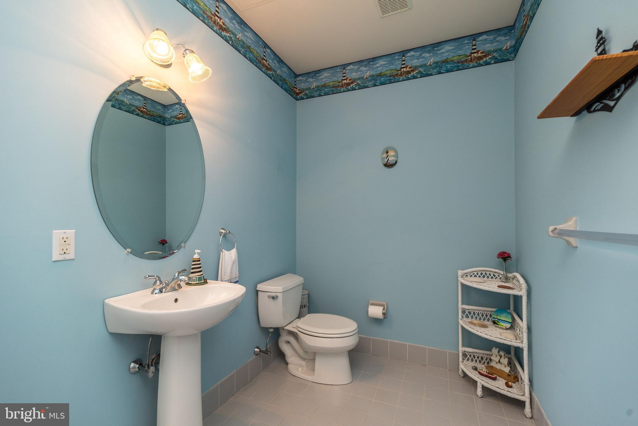 246 Rue St Andre Chalfont, PA 18914 - Photo 76 of 81 a bathroom with a sink toilet and a mirror