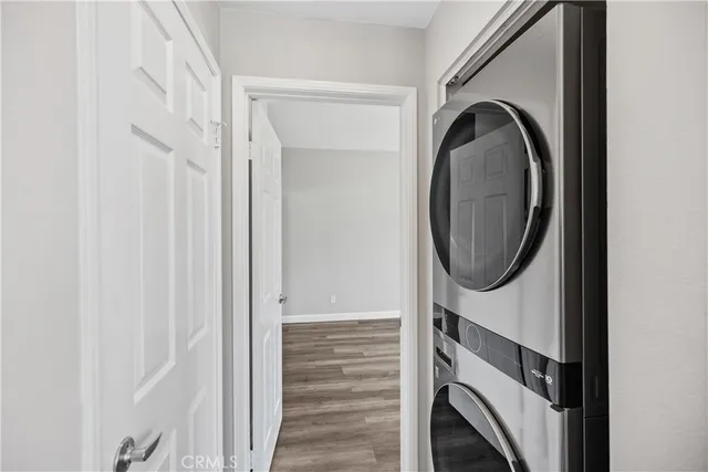 a close view of a utility room with dryer and washer