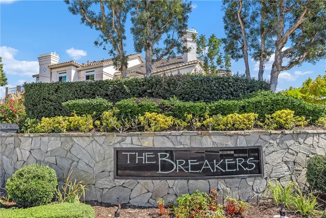 a view of a swimming pool with lounge chairs