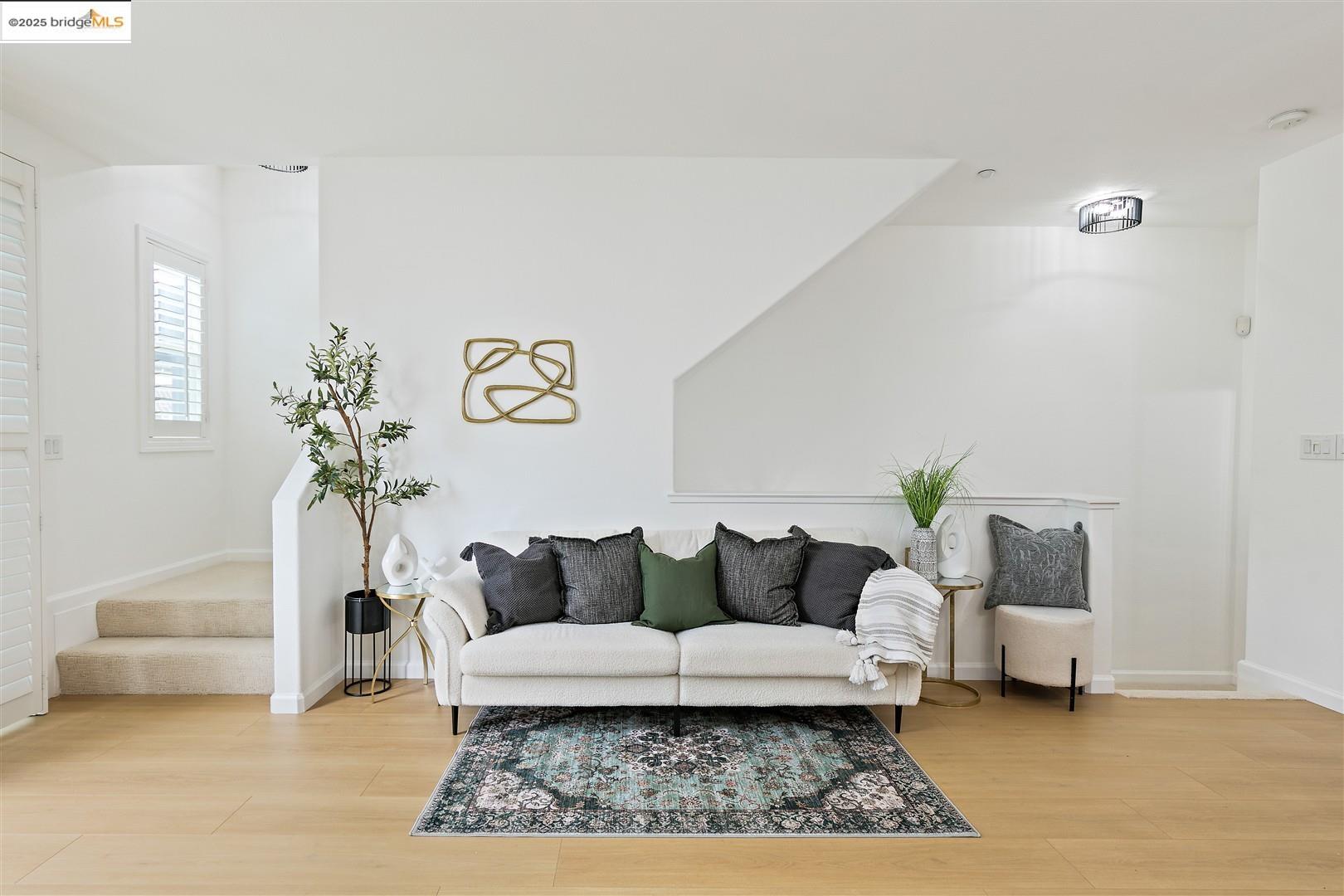 4153 Clarinbridge Circle Dublin, CA 94568 - Photo 11 of 60 a living room with furniture and a couch