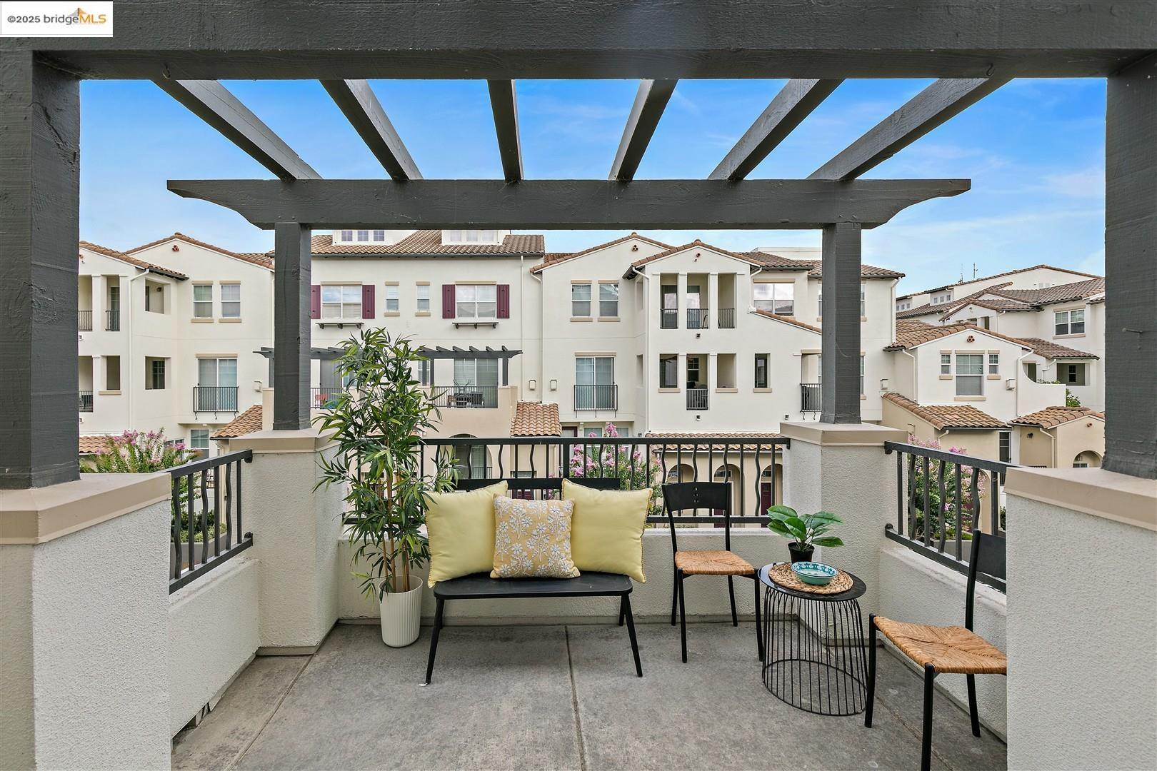 4153 Clarinbridge Circle Dublin, CA 94568 - Photo 15 of 60 a balcony with table and chairs