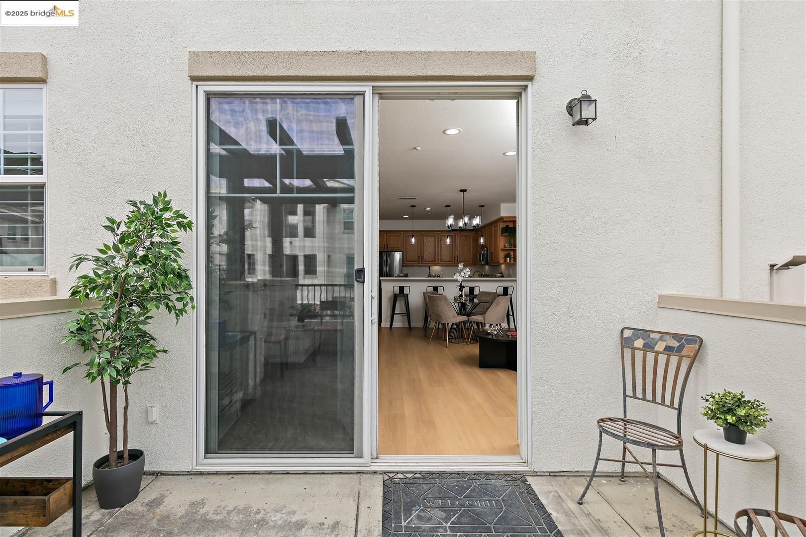 4153 Clarinbridge Circle Dublin, CA 94568 - Photo 16 of 60 a balcony with furniture and a potted plant