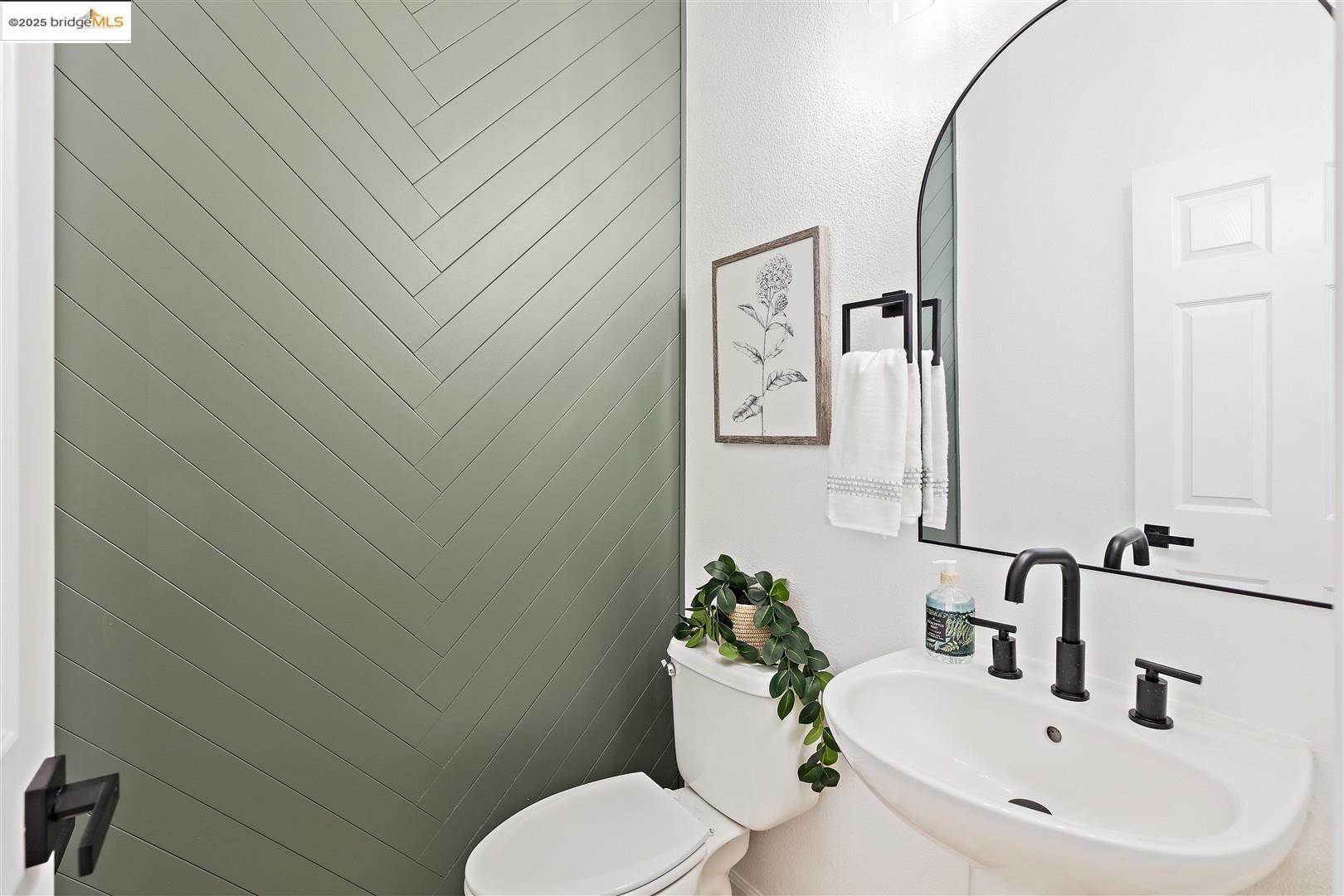 4153 Clarinbridge Circle Dublin, CA 94568 - Photo 17 of 60 a bathroom with a sink mirror and toilet