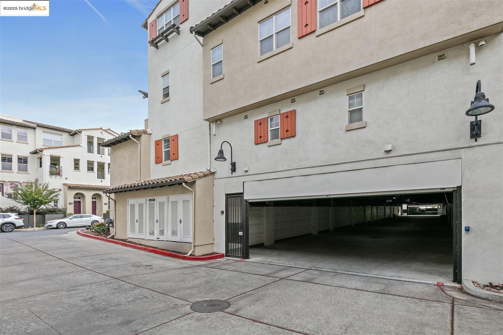 4153 Clarinbridge Circle Dublin, CA 94568 - Photo 31 of 60 Rear view of property with stucco siding and a garage