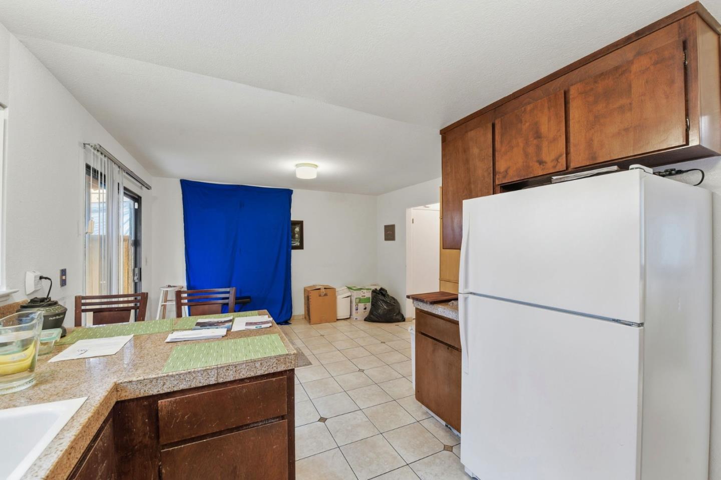 1349 Coniston Court San Jose, CA 95118 - Photo 14 of 55 a kitchen with refrigerator and cabinets