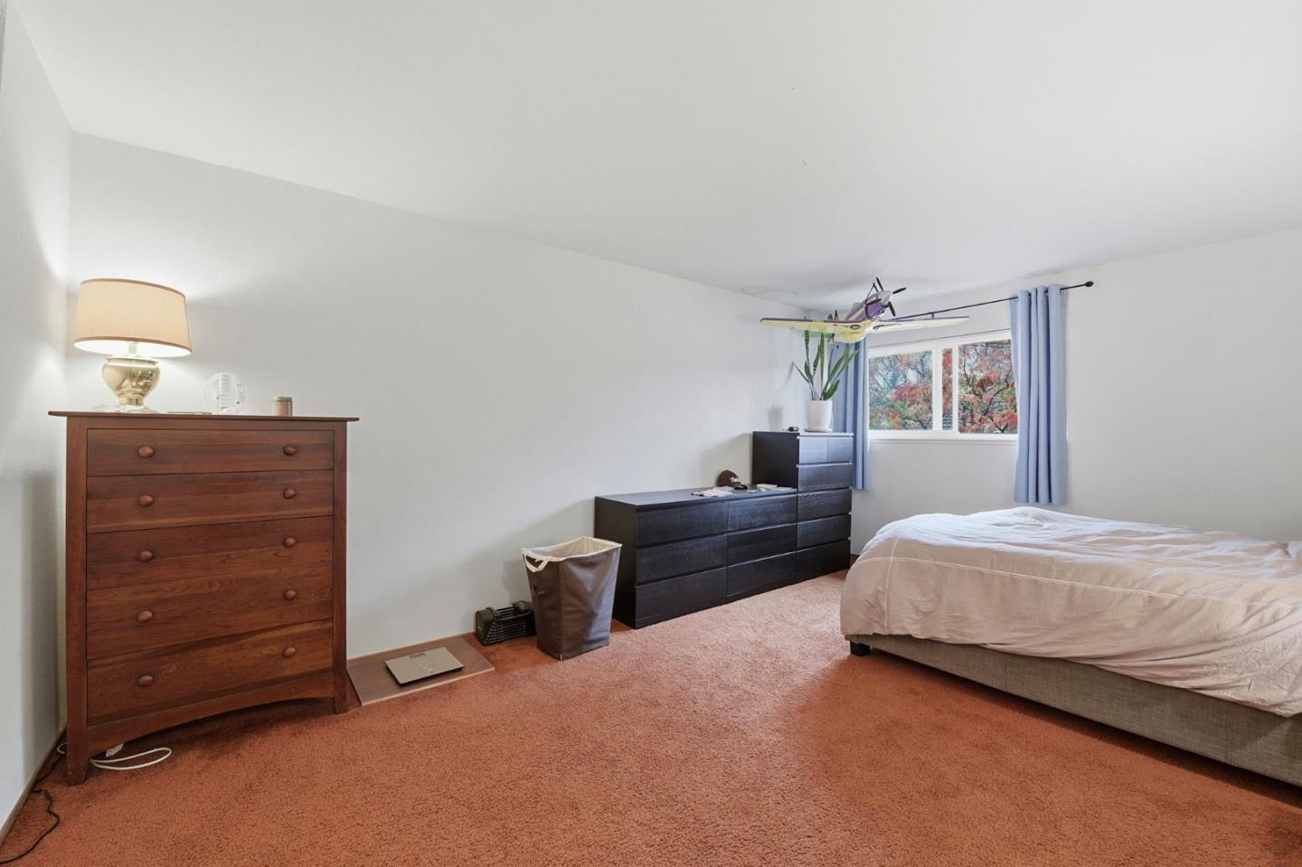 1349 Coniston Court San Jose, CA 95118 - Photo 20 of 55 a bedroom with a bed and window