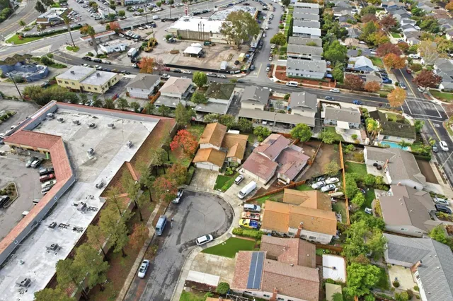 an aerial view of residential building with parking space