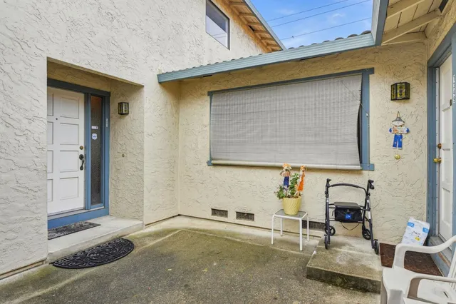 a front view of a house with outdoor space