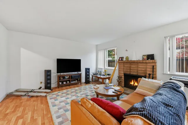 a kitchen with a stove a sink and a refrigerator