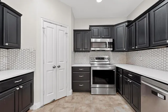 a bathroom with a sink a mirror and a bathtub