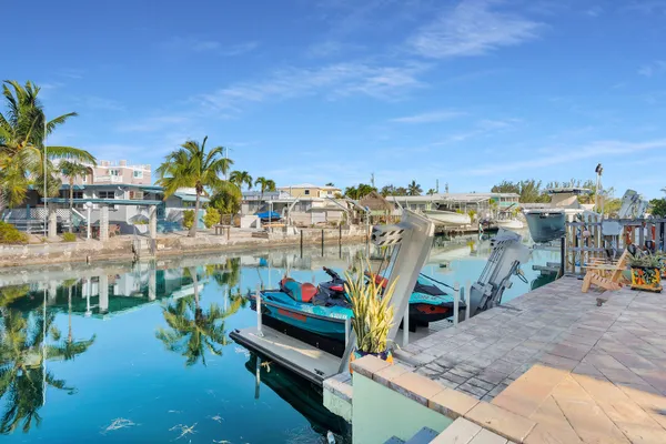 a view of a chairs and tables in the terrace
