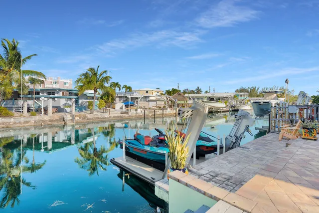 a view of a chairs and tables in the terrace