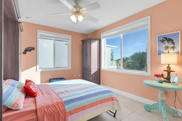 a kitchen with stainless steel appliances a sink stove and cabinets