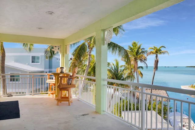 a bed room with a bed and a couch