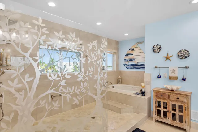 a bedroom with a bed and a chair