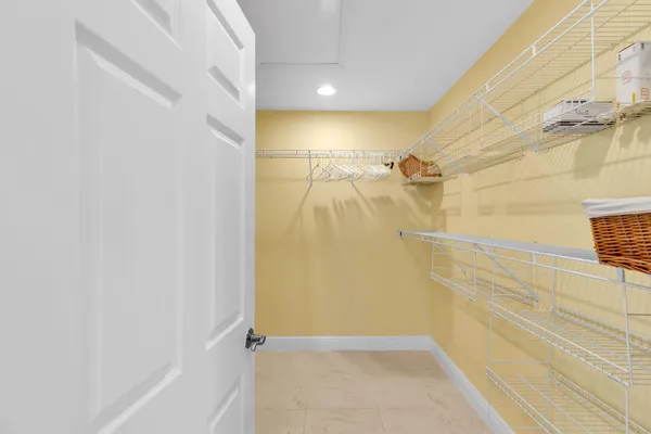 a en suite bathroom with a sink and a mirror