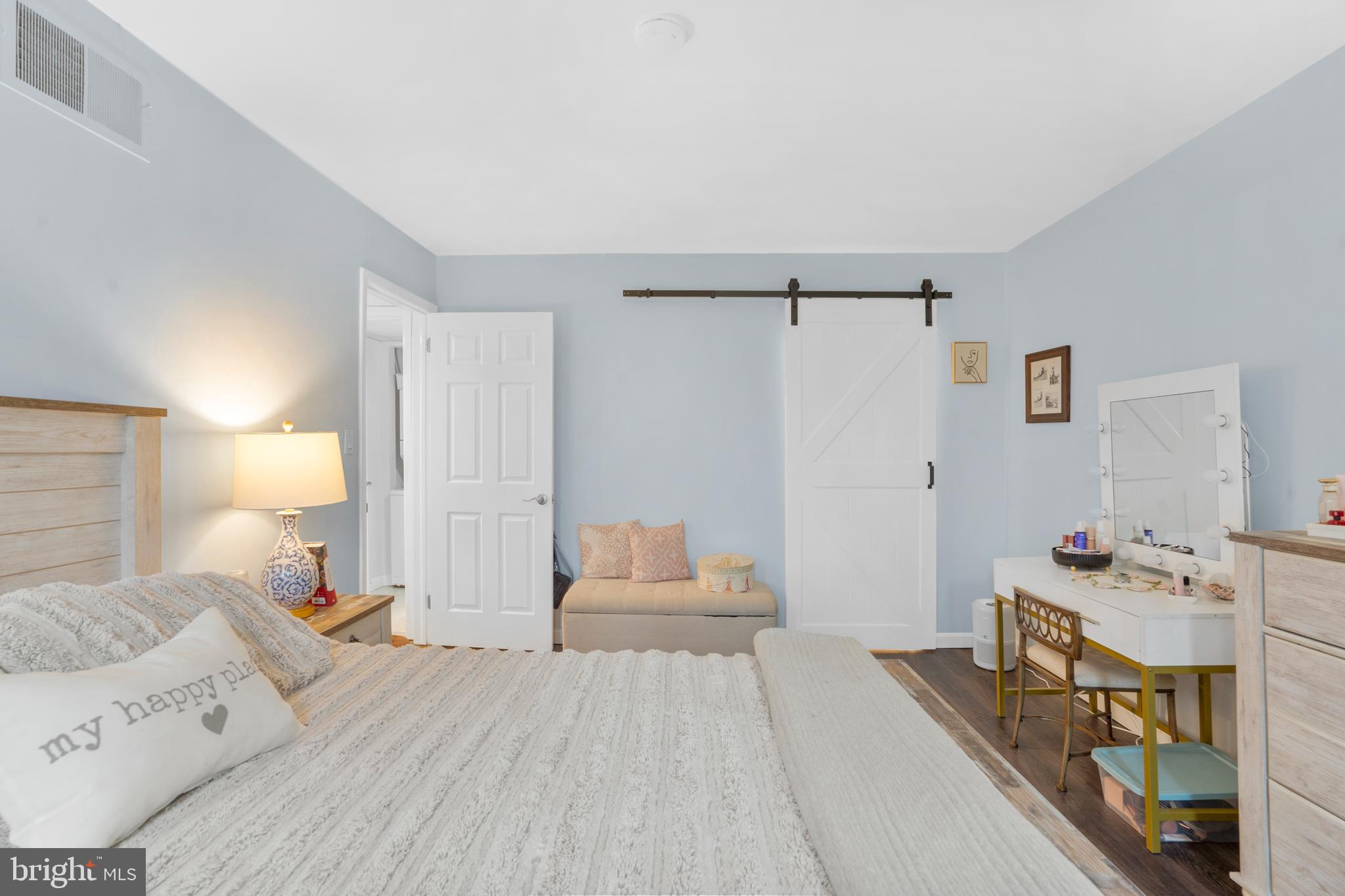25 Church Road, Unit 56 Maple Shade, NJ 08052 - Photo 17 of 28 a bedroom with a bed and a couch