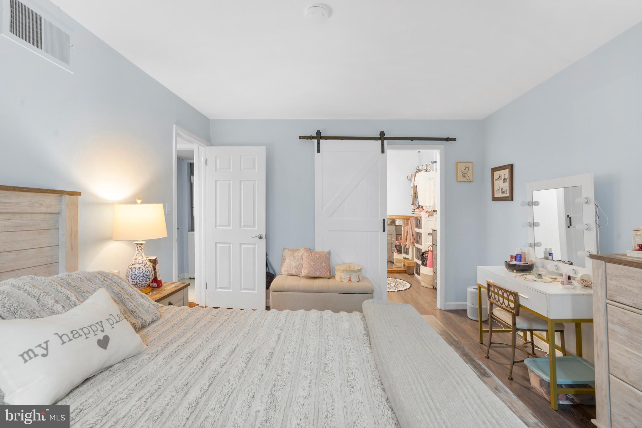 25 Church Road, Unit 56 Maple Shade, NJ 08052 - Photo 18 of 28 a bedroom with furniture and a wooden floor