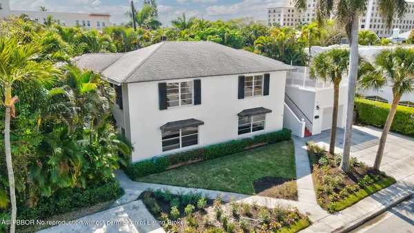 a aerial view of a house with garden