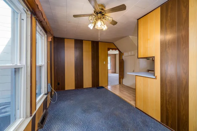 a view of an entryway with a chandelier