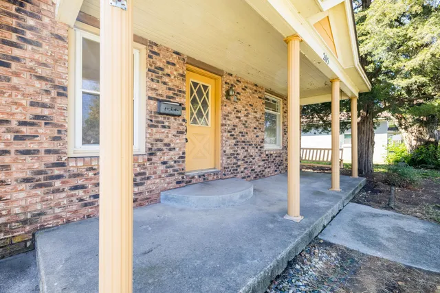 a view of a bathroom with a glass door